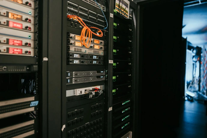 a rack of servers in a server room cloud